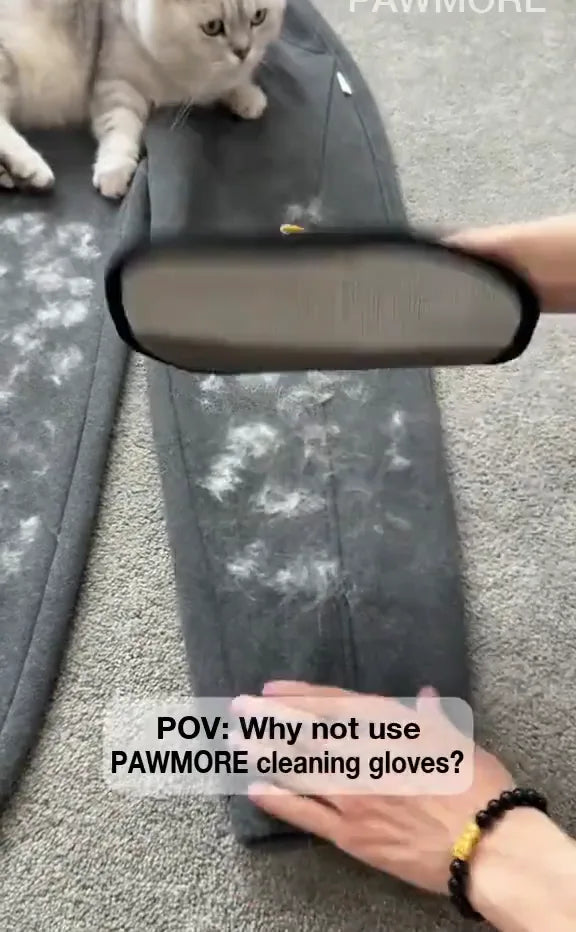 FurSweep Mitt removing cat hair from grey upholstery.
